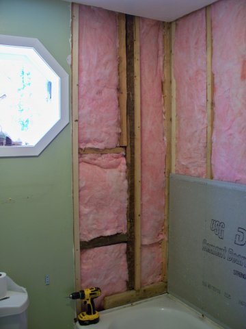 New studs and insulation on a new tile job